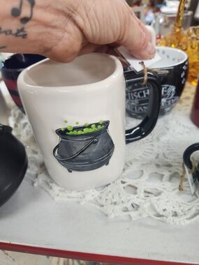 White Ceramic Mug with Black Cauldron Design